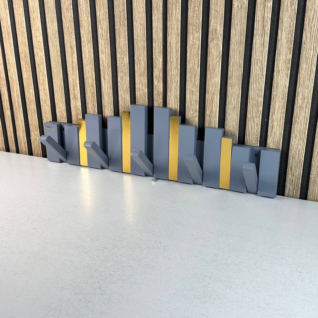 Patère Murale à Touches Pliables : L'Alliance du Design et de l'Espace